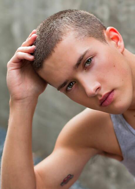 American young dude Sean Ford undressing and showing his butt outside