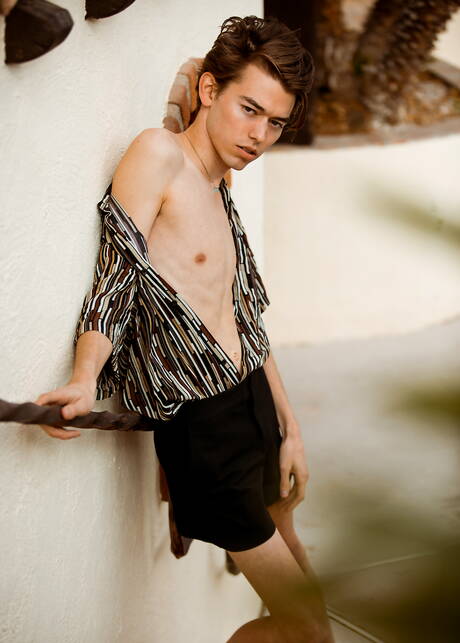 American young Austin Lovett undressing and showing his butt