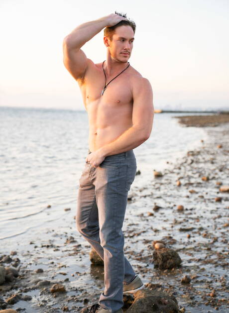 Lane and american strongman Jax Hayes fuck ass after sucking cock on the beach