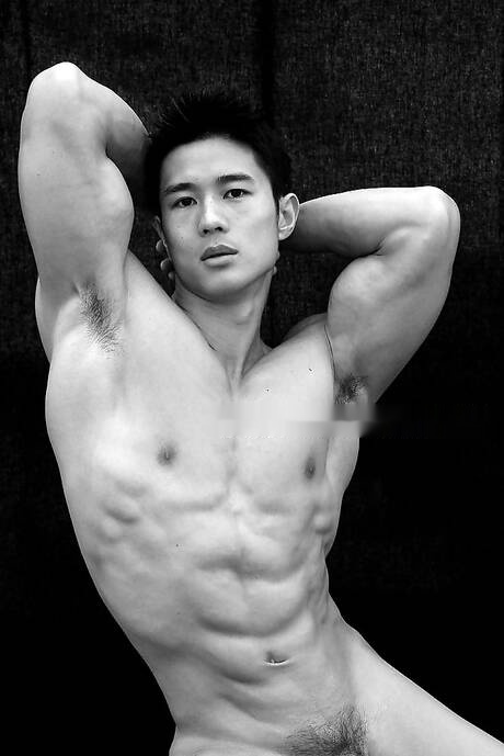 Asian strong bull Peter Le shows a muscle body