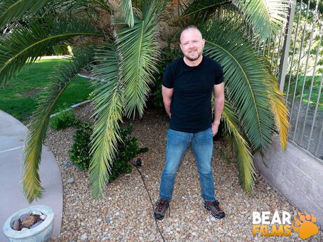 Bear Mitch Harrison undressing outside