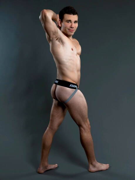 Strong bull Tim Grayson teasing his cock