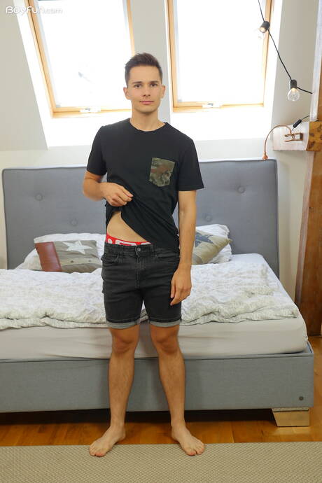 Beautiful boy Liam Butler undressing and showing his ass