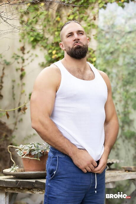 Spanish tough guy Allen King and american muscular Chuck Conrad have anal sex outdoor